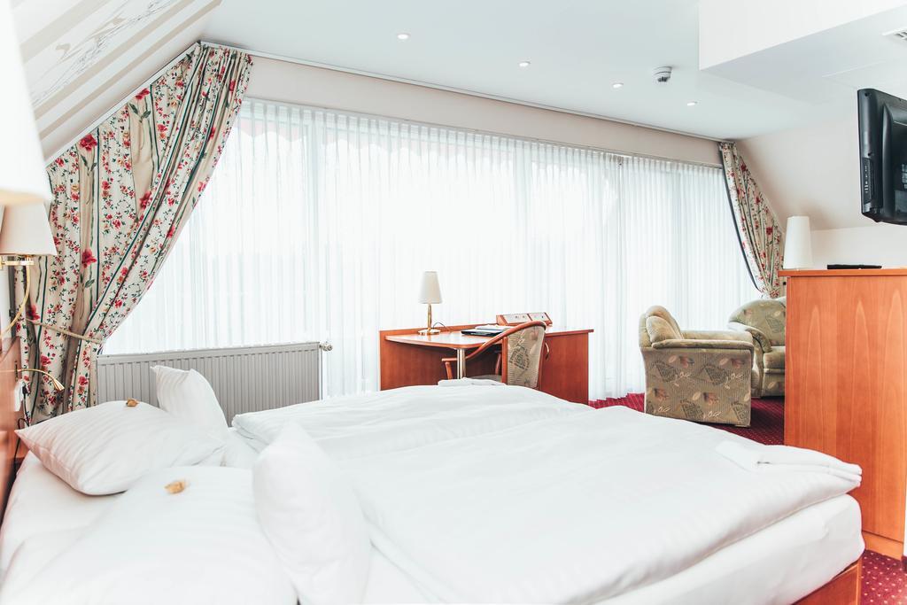 Ringhotel Teutoburger Wald Текленбург Номер фото